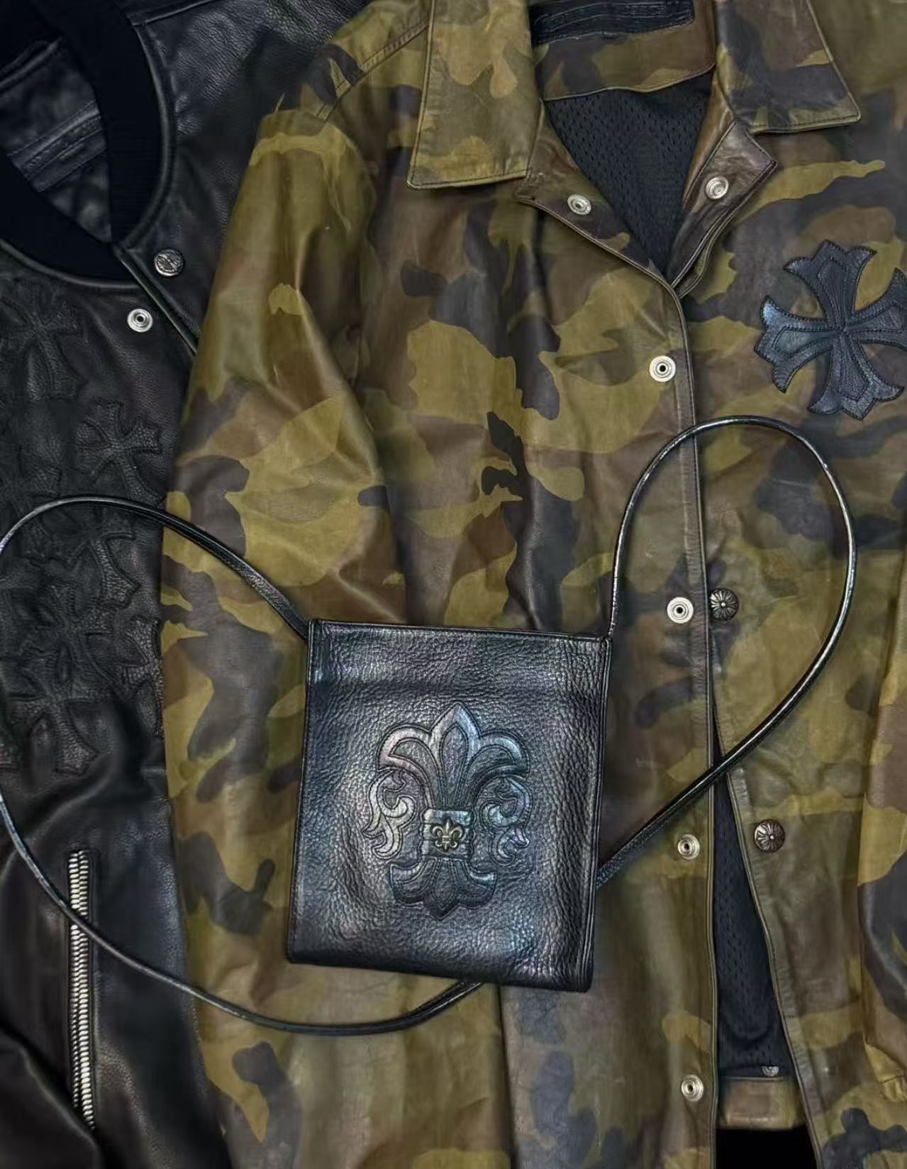 Leather accessories styled with a camouflage jacket